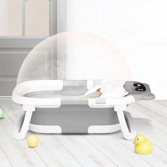 baignoire pliable bébé avec protection gris et jouets de bain