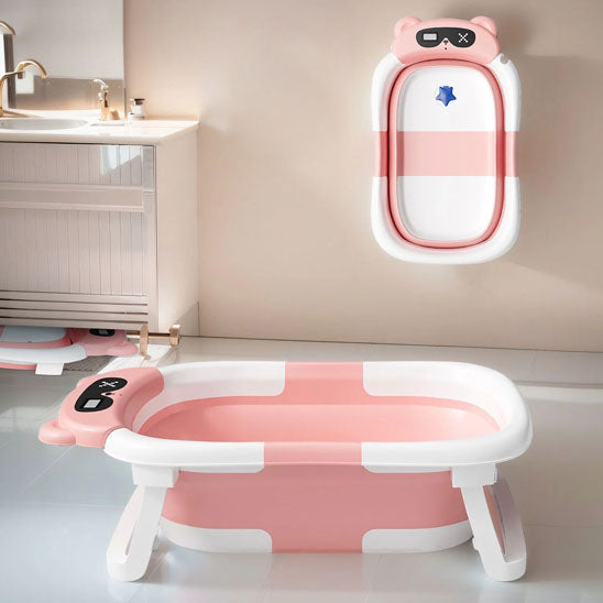 baignoire pliable bébé rose dans  toilette