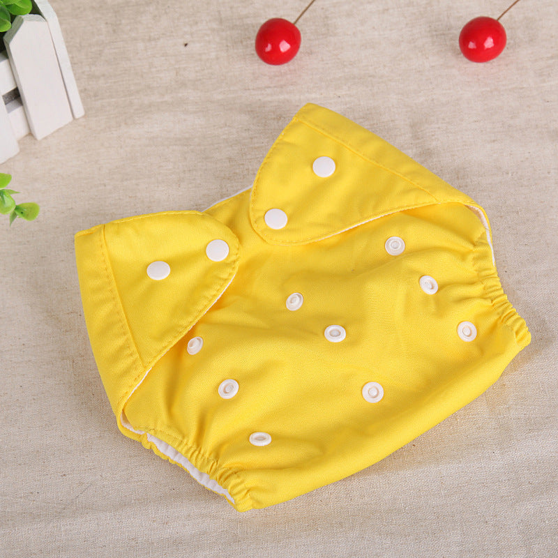 Couche lavable pour bébé jaune